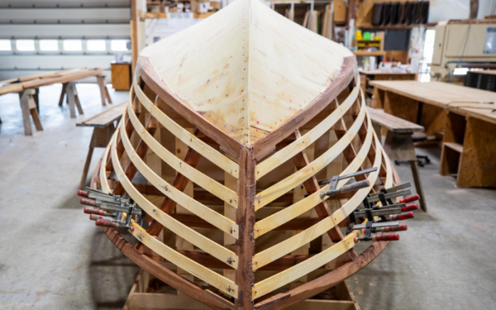 Untitled design - 2024-11-18T112902.575 wood-hulled mahogany runabout